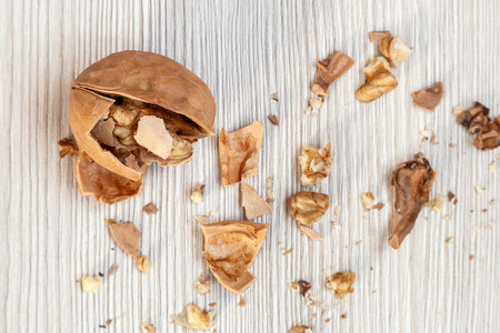 inshell walnuts  on a wooden isolated background. Walnuts patternの写真素材