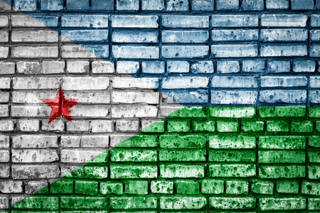National flag of Djibouti on a brick background. Concept image for Djibouti: language , people and culture.の写真素材