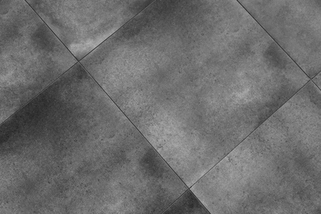 Real  gray floor tile pattern for background. Pavement outdoors in shades of greyの写真素材
