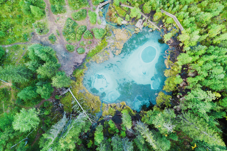 Aerial view on  panoramic landscape  of a beautiful bay on the blue lakes. View from above of crystal clear lake and green forest. Helicopter drone shot on natureの写真素材