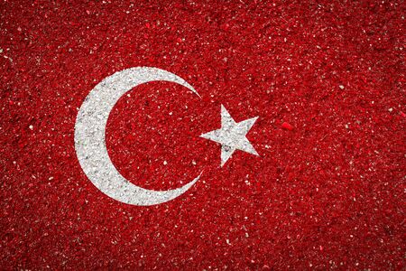 National flag of Turkey on a stone background.The concept of national pride and symbol of the country.の写真素材
