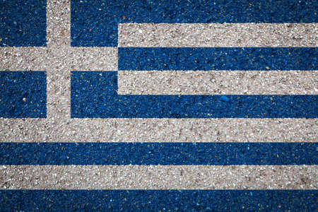 National flag of Greece on a stone background.The concept of national pride and symbol of the country.の写真素材
