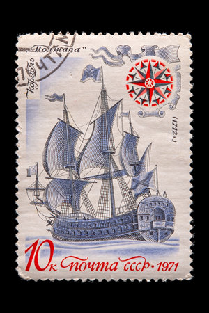 Novosibirsk, Russia - January 07, 2020: stamp printed in USSR shows howthe famous old Russian sailing warship "Poltava" three-deck with sails, built in 1712. A postage stamp circa 1971のeditorial素材