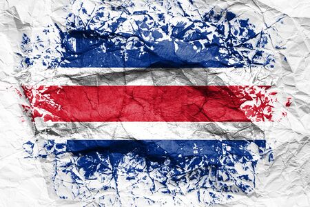 The national flag of the Costa Rica
 is painted on crumpled paper. Flag printed on the sheet. Flag image for design on flyers, advertising.の写真素材