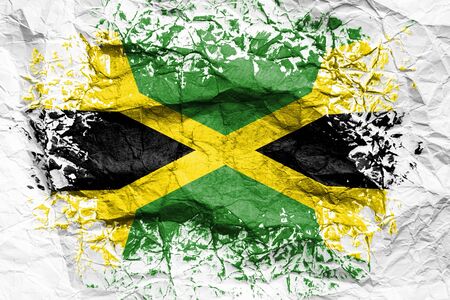 The national flag of the Jamaica
  is painted on crumpled paper. Flag printed on the sheet. Flag image for design on flyers, advertising.の写真素材