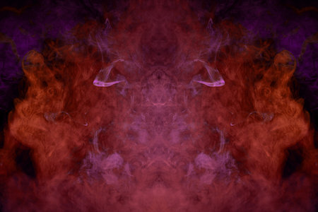 Smoke of pattern pink and red   in the form of horror monster on a dark isolated background.  Scary...