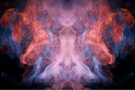 Red  and blue cloud of smoke of  black isolated background in the form of a skull, monster, dragon...