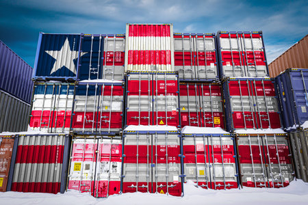 The national flag of Liberia on a large number of metal containers for storing goods stacked in rows on top of each other. Conception of storage of goods by importers, exportersの写真素材