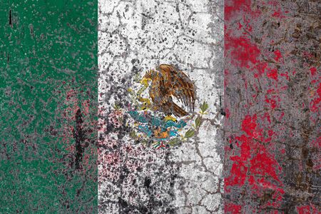 National flag of Mexico on old peeling wall background.The concept of national pride and symbol of the country.の写真素材