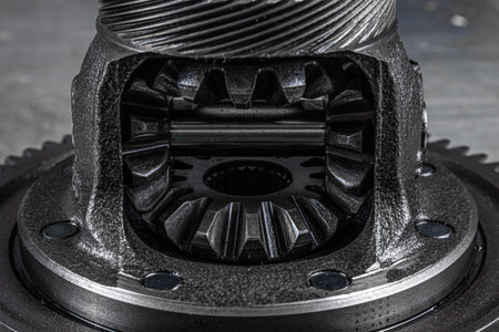  Shiny gears for planetary gearbox.Metal  autotechnology background. differential gears, close up