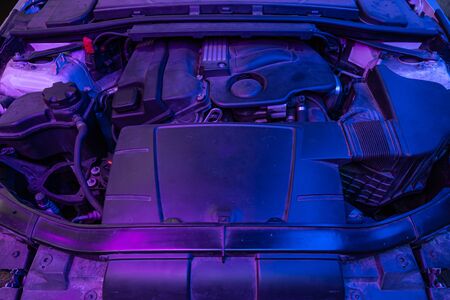 Closeup of a clean motor block in neon purple light, . Internal combustion engine
の写真素材
