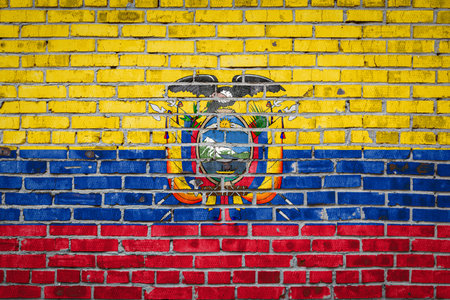 National flag of Ecuador  depicting in paint colors on an old brick wall. Flag  banner on brick wall background.の写真素材