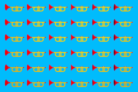 3d illustration of a musical instrument trumpet in yellow-red color in cartoon style on a blue isolated background. Patter, texture from musical trumpets in rowsの写真素材