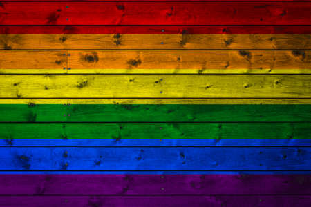 The  flag of LGBT is painted on a camp of even boards nailed with a nail. The symbol of the country.の写真素材