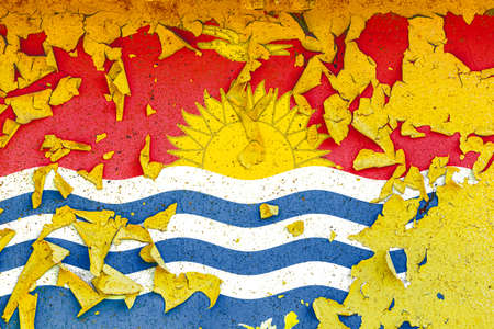The national flag of Kiribati is painted on an old metal wall with ragged paint. Country symbol.の写真素材