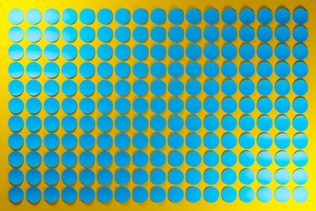 3d illustration of rows of blue circles .Set of circles on monocrome yellow background, pattern....