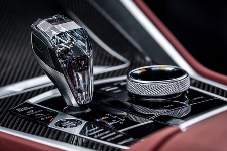 Car detailing.Chrome automatic transmission lever shift. Accelerator handle and parking buttons