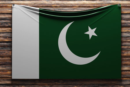 3D illustration of the national fabric flag of Pakistan nailed on a wooden wall .Country symbol.の写真素材