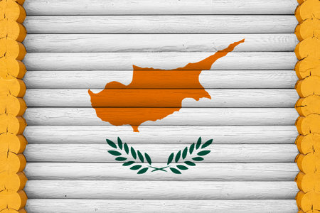 National flag of Cyprus on a wooden wall background. The concept of national pride and a symbol of the country. Flags painted on a houseの写真素材