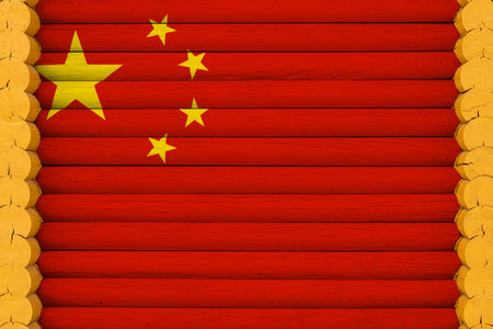 National flag of China on a wooden wall background. The concept of national pride and a symbol of the country. Flags painted on a houseの写真素材