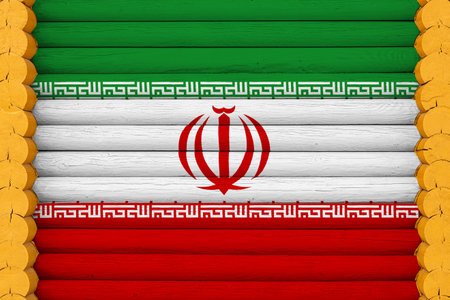 National flag of Iran on a wooden wall background. The concept of national pride and a symbol of the country. Flags painted on a houseの写真素材