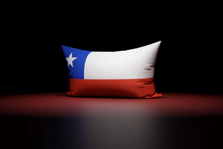 3d illustration of rectangular pillow depicting the national flag of Chile under red light on black isolated backgroundの写真素材