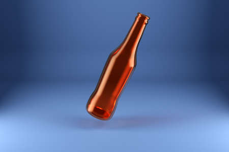 Brown glass beer bottle fling on blue isolated backgroundの写真素材