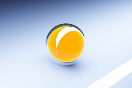 3d illustration of a yellow sphere on a blue background. A close-up of a round shape.の写真素材
