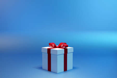3d illustration of gifts in a beautiful white packaging box, a satin ribbon bow on a blue background. Holiday attributes, gift set.の写真素材