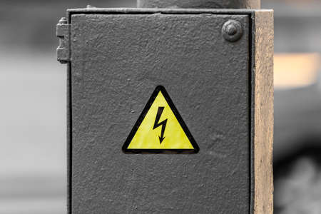 Electrical hazard sign on a junction boxの写真素材