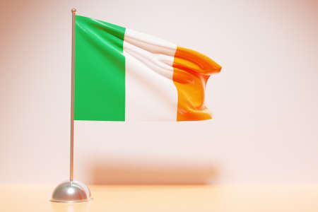 3D illustration of the national flag of Ireland on a metal flagpole fluttering .Country symbol.の写真素材