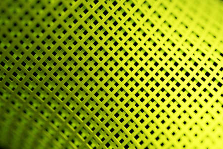 3d illustration of rows of green polygones. Parallelogram pattern. Technology geometry backgroundの写真素材