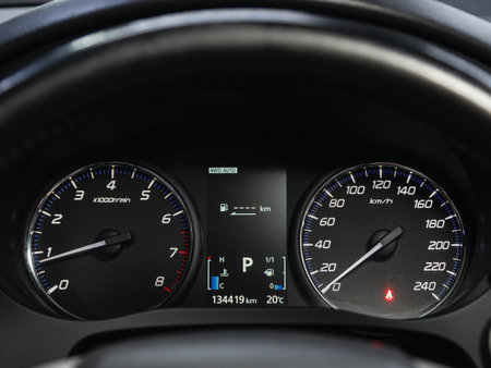 new car interior details. Speedometer, tachometer and steering wheel