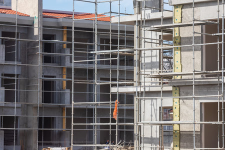 Close-up of the construction of a stone building. Construction of a new building in formwork