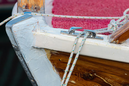 Close-up of a system for attaching ropes and carabiners on a boat