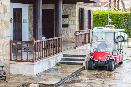 Side, Turkey -January 30, 2022: a small golf car is parked next to the hotelのeditorial素材