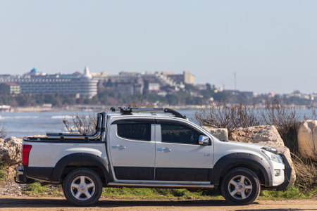 Side, Turkey â February 02 2022: silver Toyota Hilux parked on the street on a warm summer day against the backdrop of sea, hotelsのeditorial素材