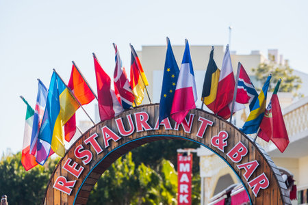 side; Turkey â February 01 2022: Close-up of national flags of different countries. Flags of Germany, Russia, Great Britain, Finland, Italy, etc. restaurant signsのeditorial素材