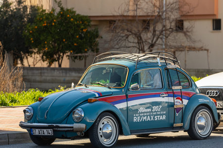 side; Turkey â€“ February 13 2022: Vintage blue car Volkswagen Beetle on the background of a...