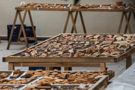 Fragments of ancient ceramics. artifacts. Archaeological finds. Fragments of old jugs. archeology.