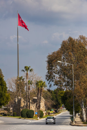 side; Turkey â February 18 2022: Turkish streets with antique ruins, , the national Turkish flag flutters in the backgroundのeditorial素材