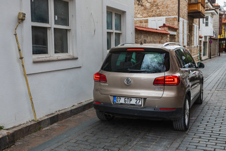 Side, Turkey â February 20 2022: brown Volkswagen Tiguan is parked on the street on a warm dayのeditorial素材