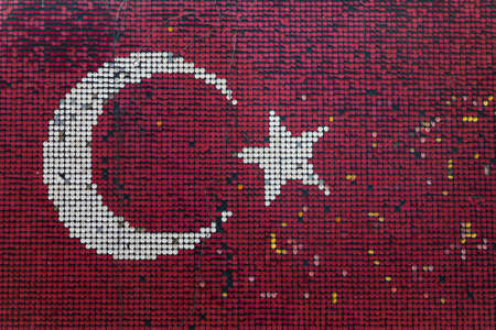 Close-up of the national flag of Turkey from multi-colored mosaicの写真素材
