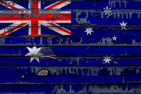 The national flag of Australia is painted on uneven boards. country symbol.の写真素材