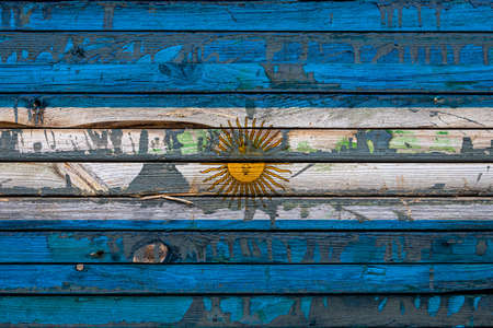 The national flag of Argentina is painted on uneven boards. country symbol.の写真素材