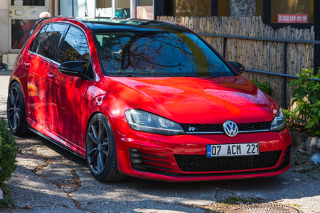 Antalya; Turkey â March 04 2022: red Volkswagen Golf is parked on the street on a summer dayのeditorial素材