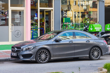 Antalya; Turkey â€“ March 03 2022: silver Mercedes-Benz CLA-class is parking on the street on a...