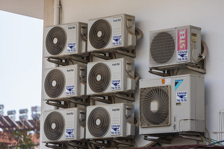 Antalya; Turkey â March 03 2022: Close-up wall in a residential building with a lot of air conditionersのeditorial素材
