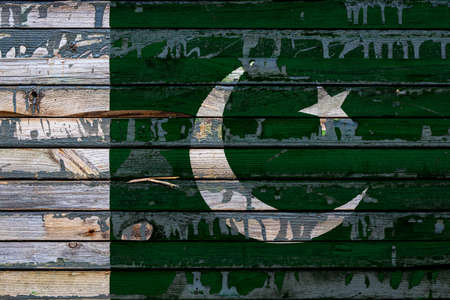 The national flag of Pakistan is painted on uneven boards. country symbol.の写真素材