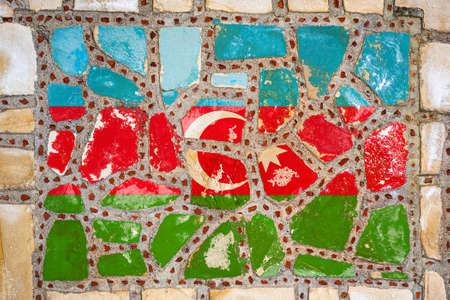 National flag of Azerbaijan on stone wall background. Flag banner on stone texture background.の写真素材